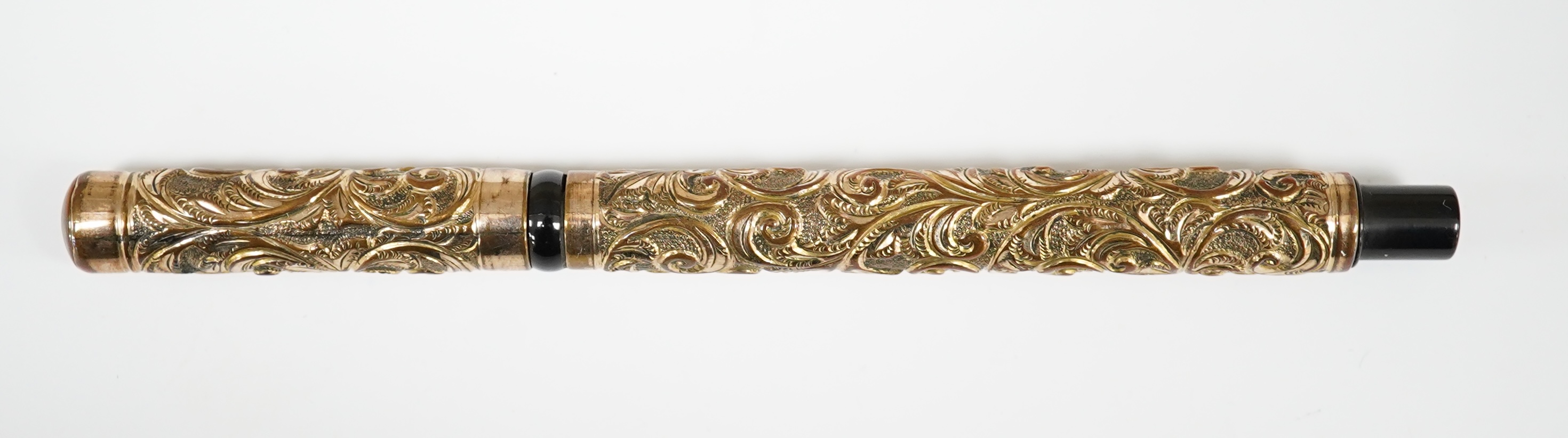 A high relief gold filled Eyedropper, with over and under feed and 14ct. gold nib